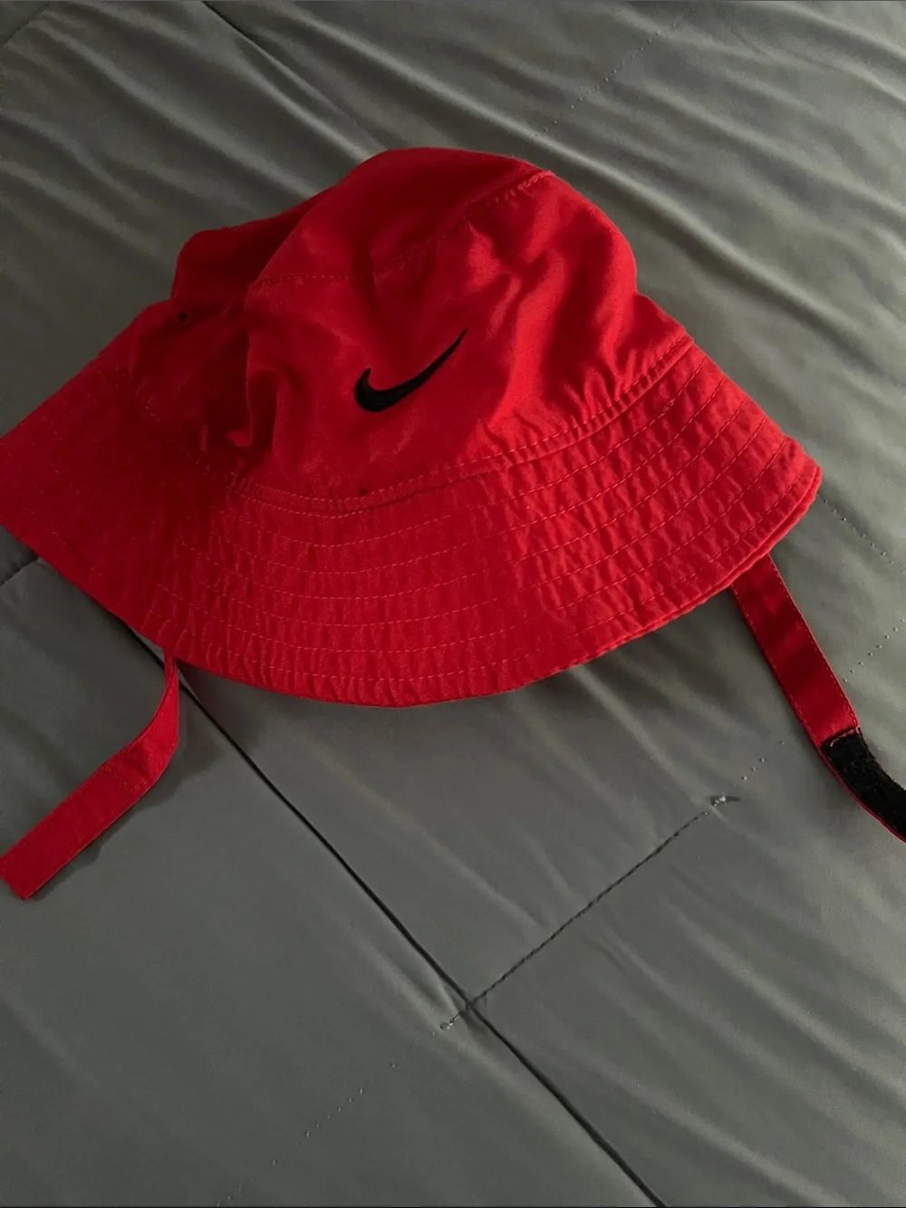 Nike INFANTS Red Bucket Hat with Black Swoosh and Chin Straps